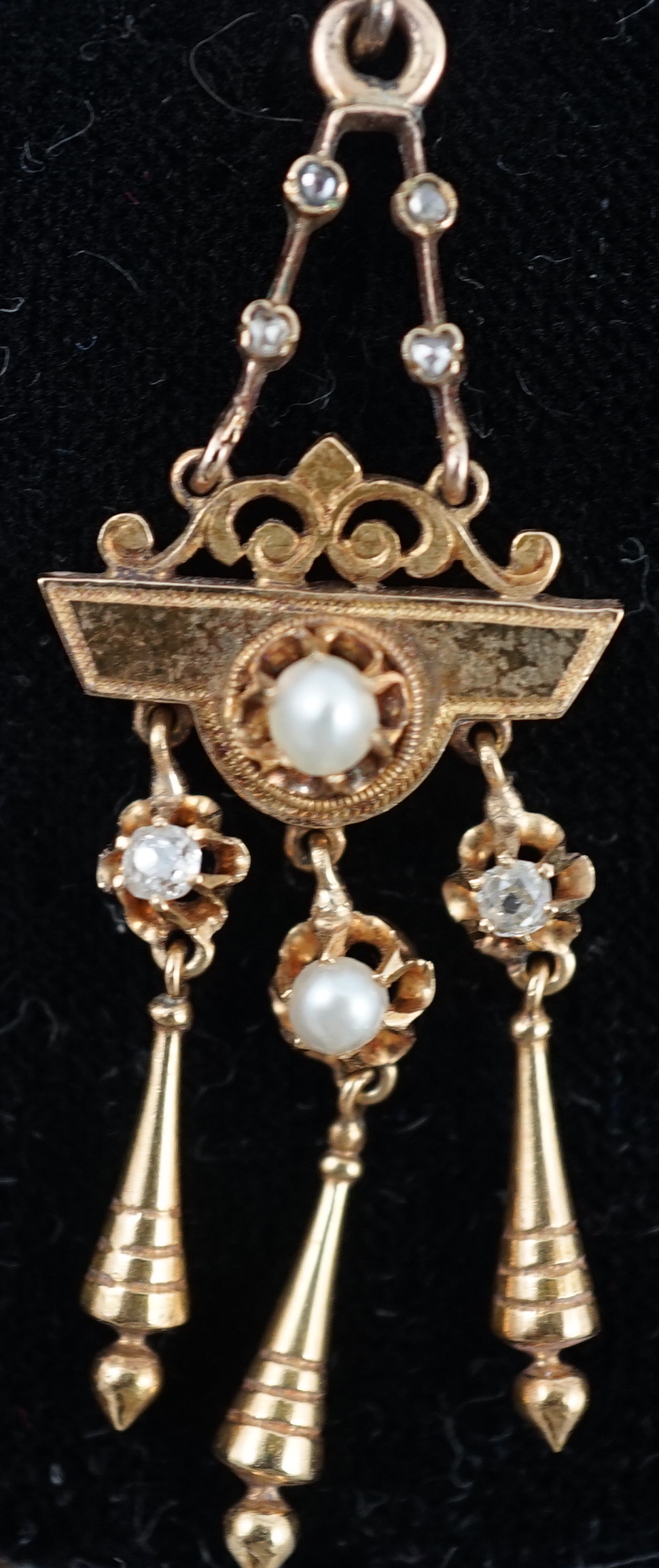 A pair of Victorian gold, seven stone diamond and two stone pearl set triple drop earrings, of aesthetic design